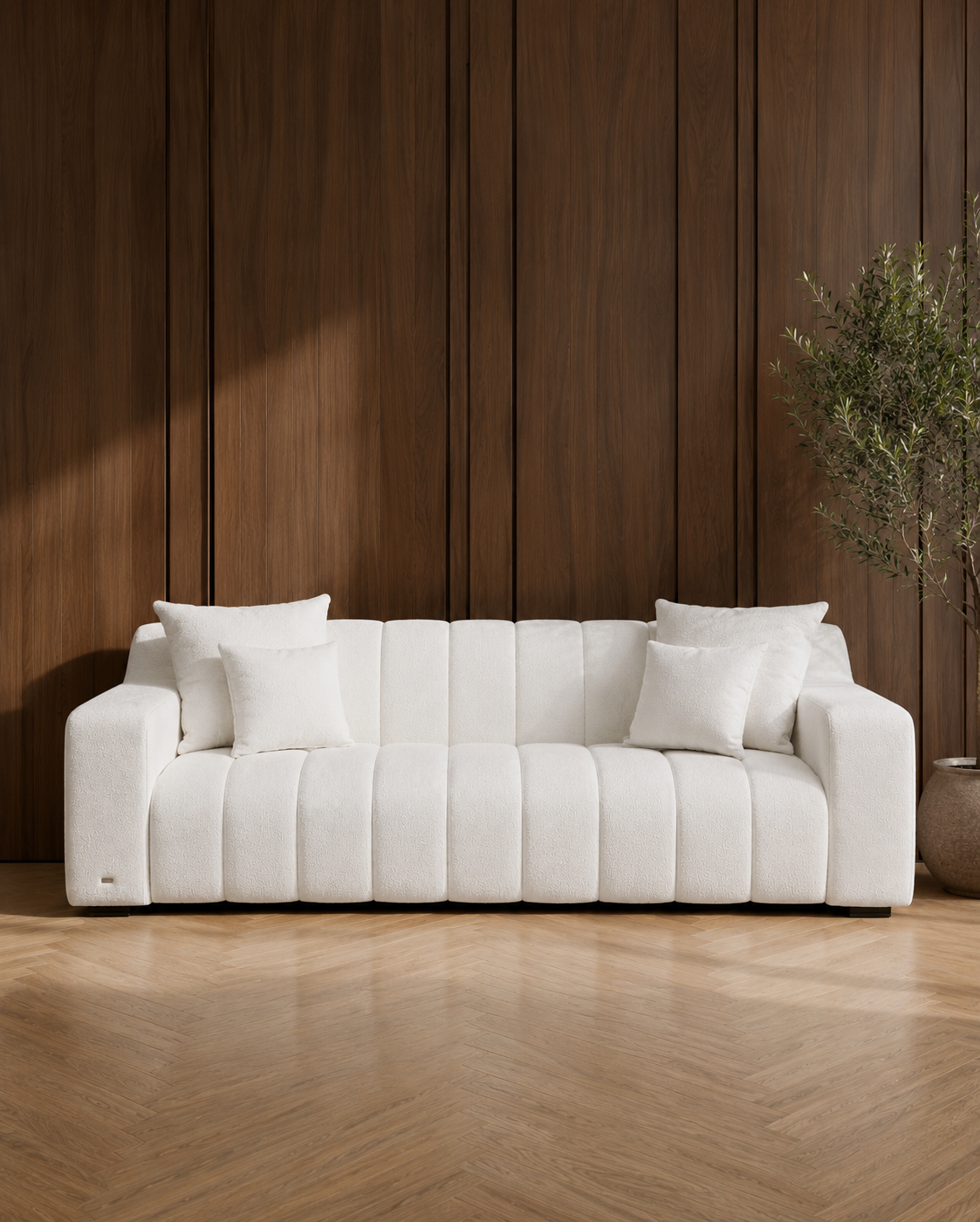 JOLIN Furniture Anella three-seater sofa with plush cushions and modern design in a cozy living room setting.