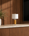 JOLIN Furniture Elaria Lamp with a sleek modern design, featuring a white ceramic base and a fabric lampshade.